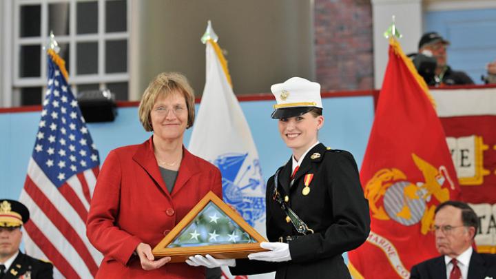 After her speech, President Faust received an American flag (previously flown over Harvard Yard and the ROTC unit’s MIT headquarters) from U.S. Marine Corps cadet Shawna L. Sinnott on behalf of all the cadets.