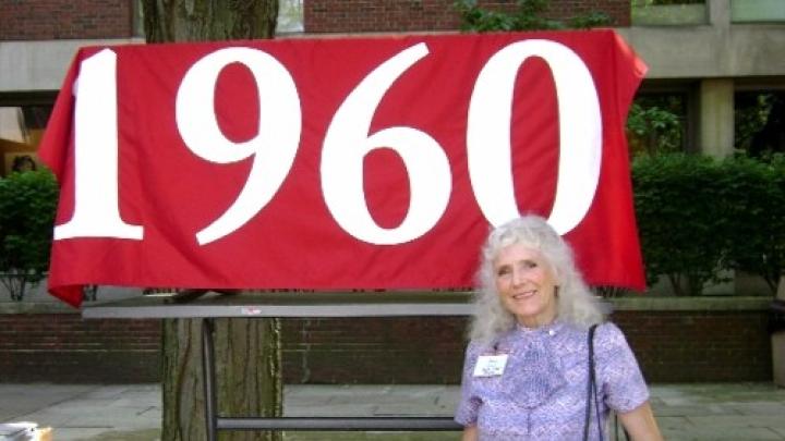 Betty Breck eagerly awaits the arrival of other 1960 classmates at the 50th Reunion Headquarters in Eliot Hall.