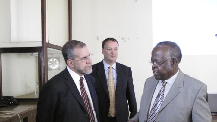 Provost Hyman and vice chancellor Kayanja talk after Hyman's lecture, as Bangsberg looks on.