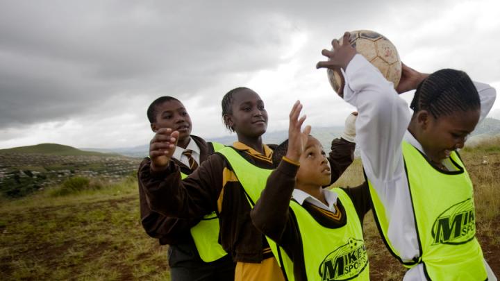 Next comes a lesson about teamwork: on mixed-gender teams, boys and girls must work together in a relay race.