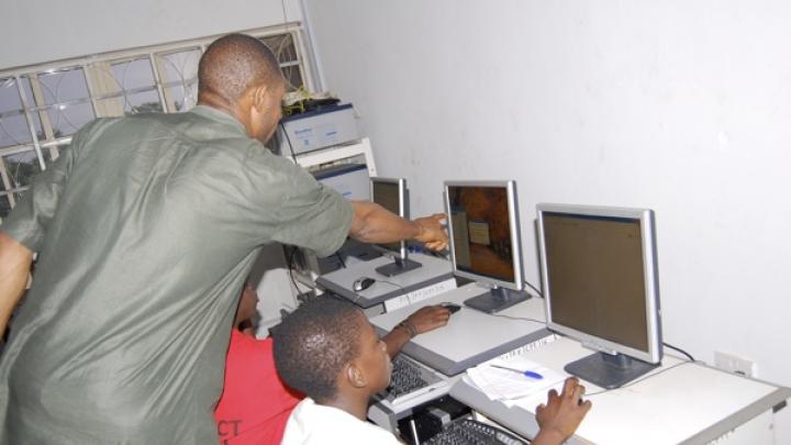 Computer education was also part of the program. For Adewale Oluwadunni, foreground in white shirt, this class was the first time she ever laid eyes on a computer.