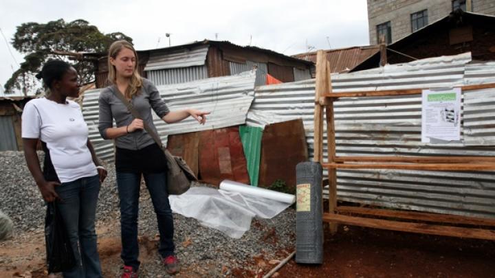 Nowak discusses the prototype with Faith Mwikali, a social worker who translated for her, introduced her to community members, and helped her conduct her nutritional survey. Mwikali works with Binti Pamoja (“Women Together” in Swahili), a Carolina for Kibera subsidiary that runs programs for women and girls.