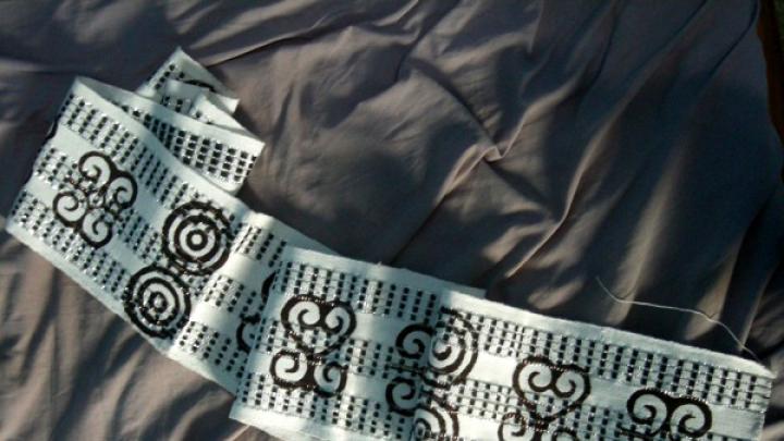 A kente strip stamped with Adinkra symbols from Ntonso. Ryan was fascinated by the fact that although such products are seen as “hyper-Ghanaian,” it’s mostly tourists buying them; the people who possess these objects rarely understand their symbols.