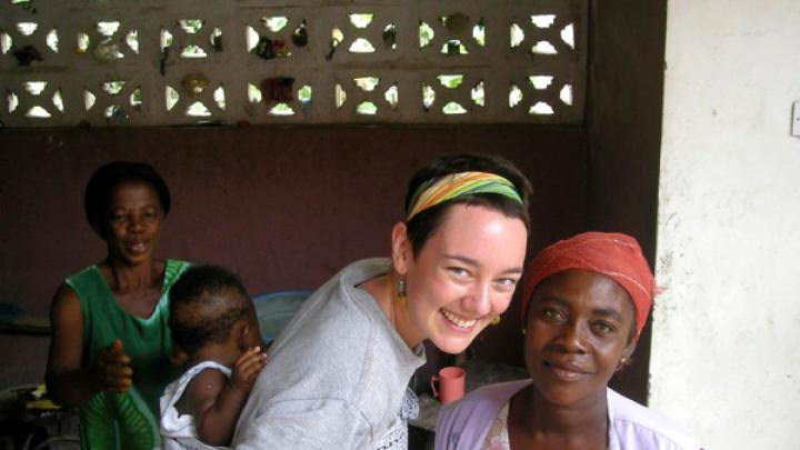 Ryan with Wozee, a neighbor in Dunkura with whom she regularly sold rice in the village schoolyard as part of her fieldwork. Her host mother, Abena Comfort Frema, appears in the background; on Ryan’s back is Frema’s granddaughter, Maame Yaa.