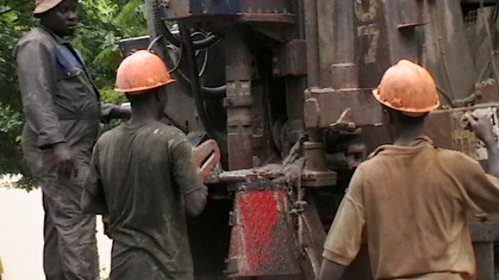 The borehole team hired by Project ACWA (Access to Clean Water for Agyementi), getting the driller ready