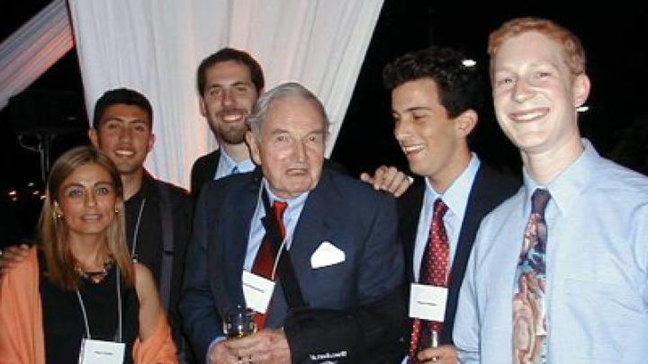 David Rockefeller meets Harvard students studying in Chile in 2003.