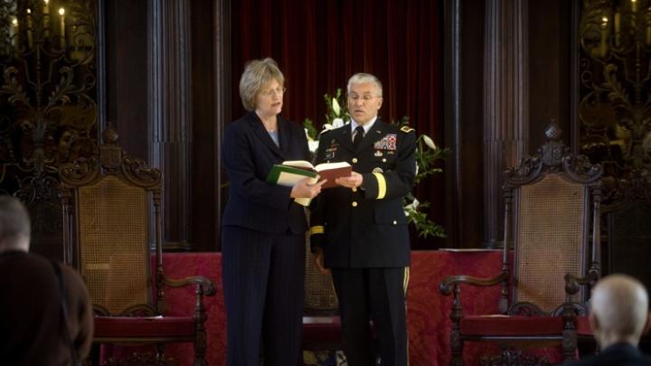 President Faust and General Casey share a hymnal while singing "America the Beautiful" near the close of the service.