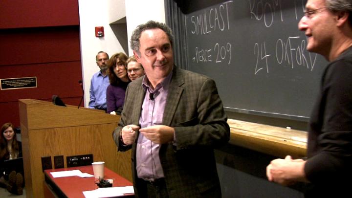 Ferran Adrià, dubbed the father of molecular gastronomy, pauses to let molecular geneticist Roberto Kolter (at right) translate during Adrià’s public lecture at Harvard.