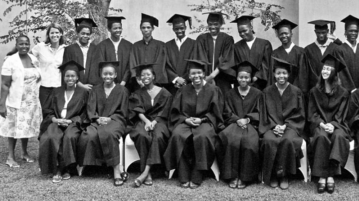 Teresa Clarke celebrates with SSP graduates and the program&rsquo;s co-founder, Nyagaka Ongeri (back row at right).
