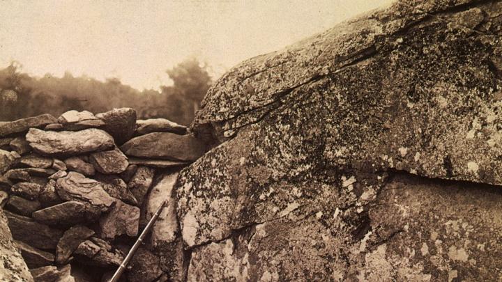 A fallen Civil War soldier with a rifle beside him, a scene that any contemporary viewer would have recognized as highly improbable