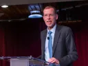 Dean Elmendorf at a podium 