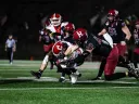 Harvard football player tackles Cornell linebacker who has the ball