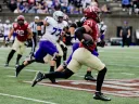 Harvard sophomore safety Ty Bartrum runs an intercepted St. Thomas pass back 96 yards for a touchdown.