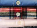 stack of flannel shirts