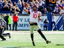 Harvard player throws ball