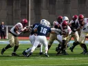 Harvard offense has the ball with Columbia defense in pursuit