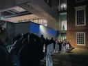 Viewers of the footage queued outside Harvard Art Museums awaiting security screening.