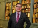 Tom Hyry photographed in Houghton Library