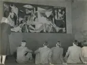 Seated students with Pablo Picasso's "Guernica" in 1941 
