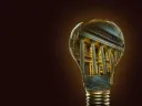 lightbulb with Harvard inside