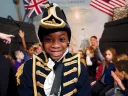 A boy in period military dress