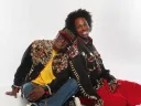 Beau McCall, at left, wearing Button Jacket: Born in Philly, Made in Harlem, circa 1988, and his partner, Souleo, wearing Button Jacket: Stacked Sleeves, circa early 1990s-2021