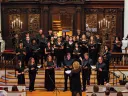 Boston Camerata performing in 2022, with a conductor in front