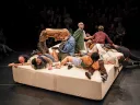 a performance of Faye Driscoll's "Weathering," where ten figures are writhing around a rotating platform