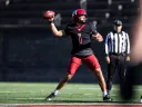 Harvard player #1 prepares to throw the ball