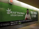 Photograph of advertising billboard promoting online gambling on sports