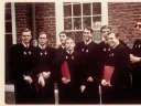Harvard graduates gather outside in 1965