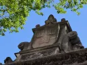 The “Veritas” motto etched into stone atop the 1875 gate into Harvard Yard