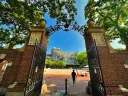 View of Harvard Science Center through a gate