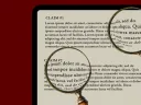 A digital tablet displaying text, with two magnifying glasses overlapping it.