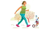 A woman jogs on a path beside a boy riding a bicycle, surrounded by trees.