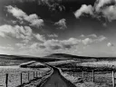 black and white scence of long road