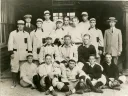 Harvard’s 1912 baseball team. Wingate (front at left, holding cap) was Fenway’s first batter.