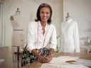 Designer Katiti Kirondé with her white shirts at the Fashion Lab of Fisher College in Boston