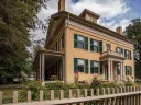 Photograph of Emily Dickinson’s family home, The Homestead, an elegant wooden building
