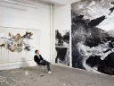Artist Shen Wei in his studio amid his large-scale abstract paintings 
