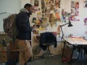 Craig and Krimes talk in an art studio