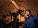 Roger Fu in the Science Center’s Loomis-Michael Observatory, where he shows fellow students the skies