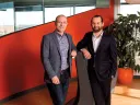 Yates (left) and Laskey have merged their talents—computer science and political communications—in Opower.