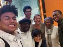 A group photo of the four Harvard undergraduates, including the author, with their project adviser and two local, older mentors