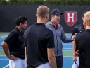 Andrew Rueb speaks to members of his team.