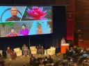 Alia Crum presents about mindfulness in allergy oral immunotherapy. Thich Nhat Hanh is on the top left of the slide. 