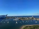 Photograph of boats at anchor on the approach to Boston’s Logan Airportn