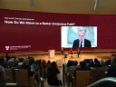 A plenary session at the Harvard Climate Symposium featured Jeremy Grantham, Janet McCabe, Gillian Tett (moderating), and via video link, Mark Carney.