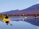 Paddlers enjoy the serenity of Flagstaff Lake, Maine.