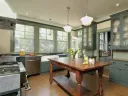 Kitchens in older homes—unlit, utilitarian, and at the rear of the house—reflect a role for women that we no longer tolerate, says remodeler Charlie Allen. This restoration aimed to connect the kitchen to the outdoors and the rest of the house.   
